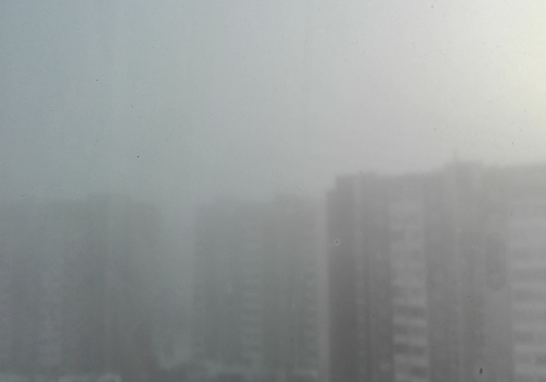 город в 
тумане